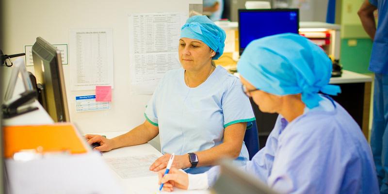 Surgical staff at desk