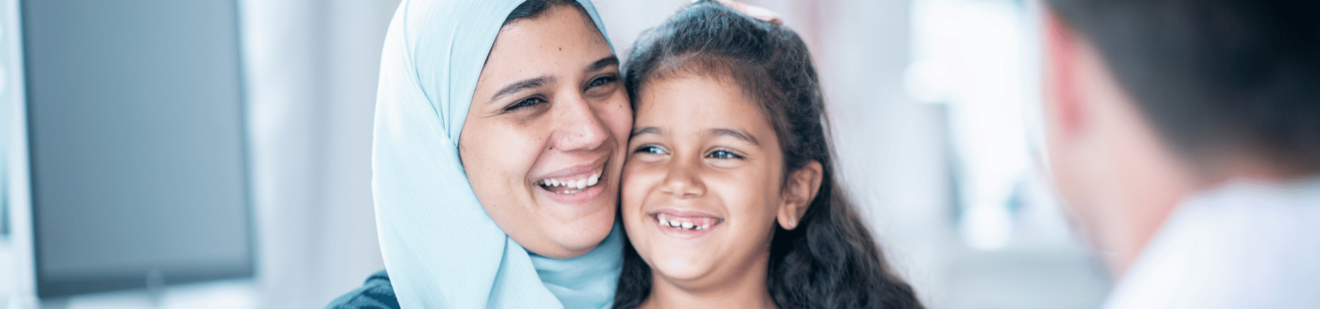 mother and daughter with doctor